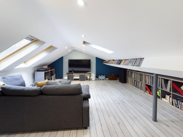 A room that could be a fifth bedroom, media room, playroom, study or alternative.