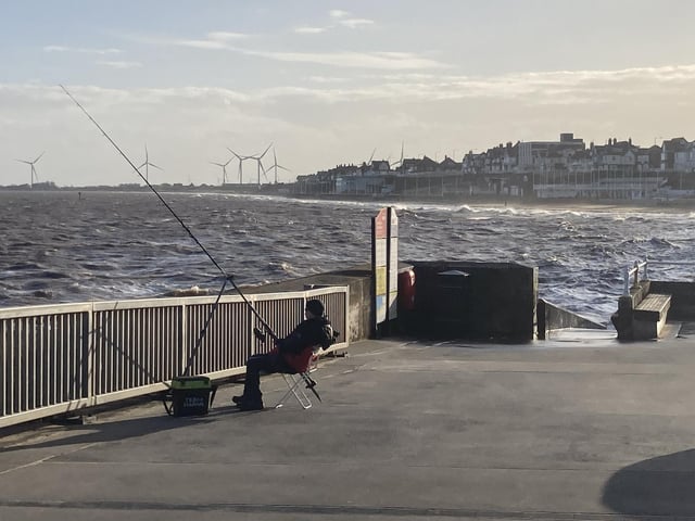 The sun encouraged local fishing enthusiasts to cast their lines.