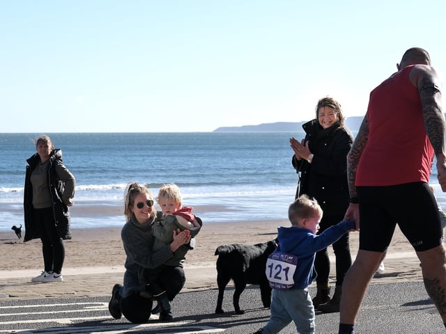 Onlookers and furry friends showed their support.