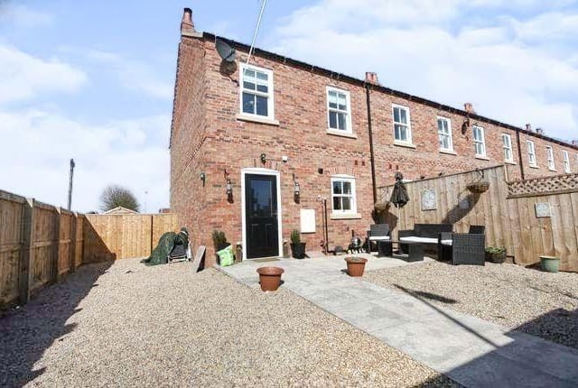 This three bedroom terraced house is for sale with Strike for £200,000.