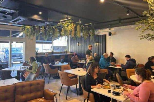 The former garage is now a food and drink hall consisting of a café, bakery, winery, retail space and ice cream parlour