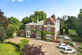 The majestic house stands in over an acre of gardens and grounds.