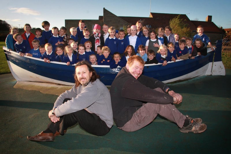 Pictured are Geoff Delve, left, and Gary Chadfield who both helped to restore Lythe Primary School's boat free of charge.