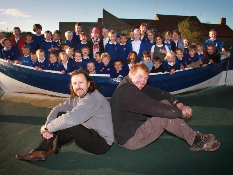 Pictured are Geoff Delve, left, and Gary Chadfield who both helped to restore Lythe Primary School's boat free of charge.