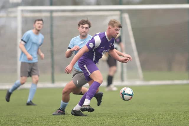 Brid Spa, purple kit, drew 3-3 at Langtoft. Photos by TCF Photography