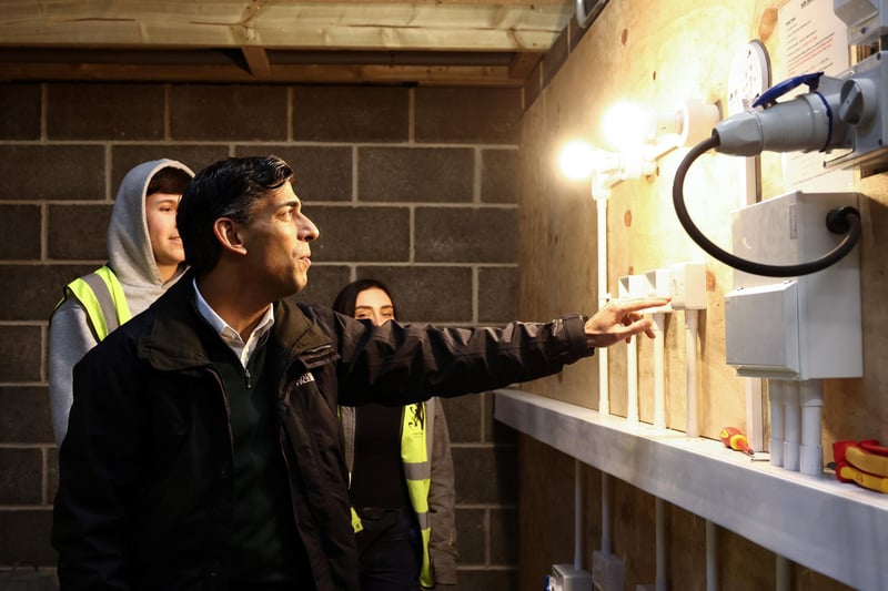 The Prime Minister Rishi Sunak took part while he visited the Construction Skills Village. Picture by Darren Staples-WPA Pool/Getty Images.