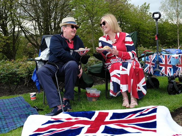 Enjoying a picnic at the Coronation celebration at Pannett Park.