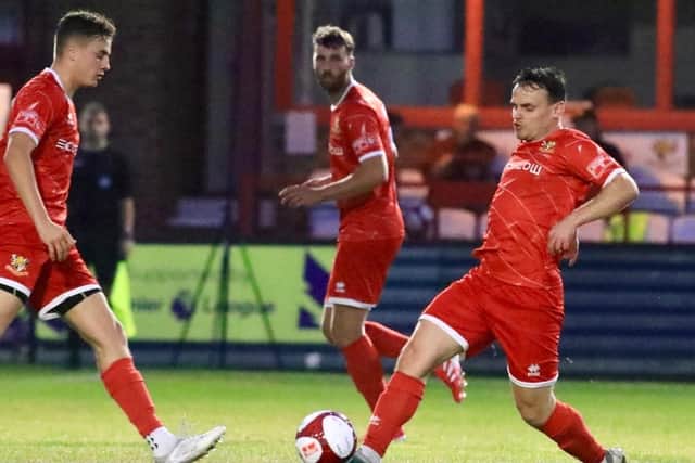 Matty Dixon gets stuck in for Bridlington Town against Knaresborough. Photo by TCF Photography