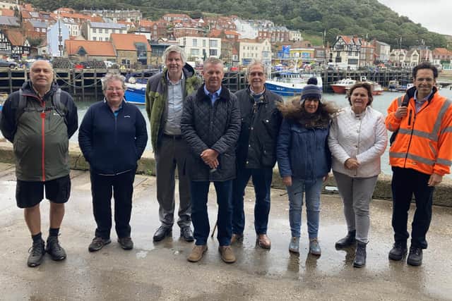 At Scarborough Harbour, from left: Couns Subash Sharma, Heather Phillips, Neil Swannick, Malcolm Taylor, David Chance, Janet Jefferson, Heather Moorhouse and George Jabbour.