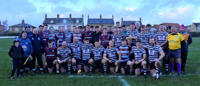 Pocklington RUFC and Old Pocklingtonians players line up after their annual Boxing Day game. Picture Andy Nelson.