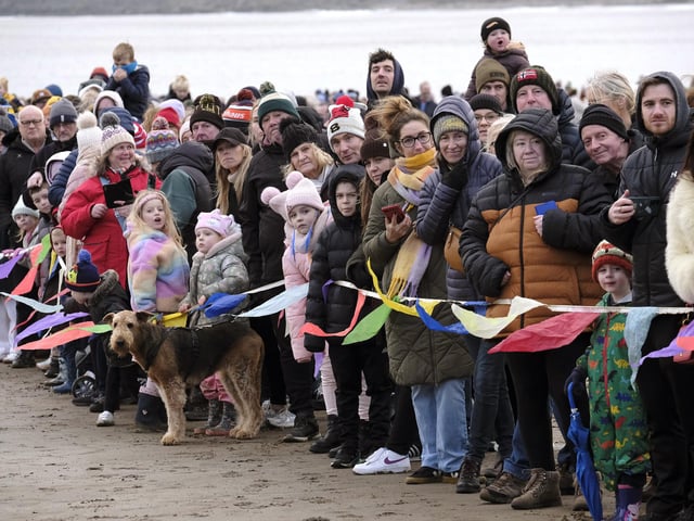 Crowds gather to watch the spectacle