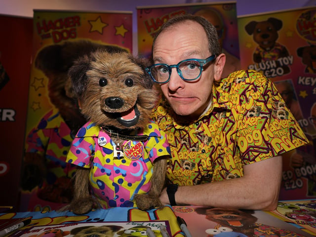 Hacker the dog and Phil Fletcher at Comic Con.