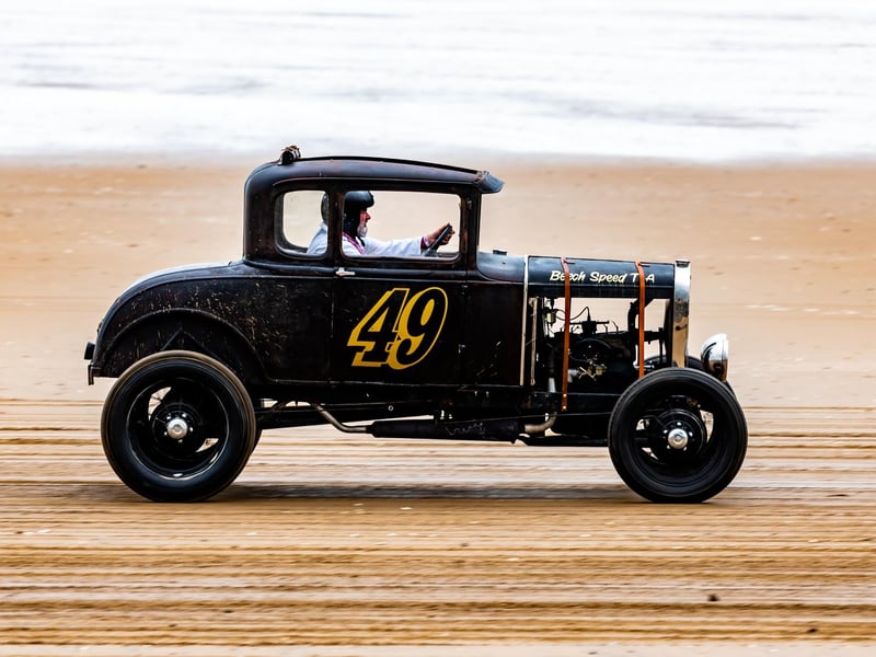 This years The Race the Waves Vintage Beach Race festival held on Bridlingon's south beach with over one hundred competitors taking part in the event from the early years of coastal motor racing to post-war American hot-rodders and drag racing culture. Picture By Yorkshire Post Photographer,  James Hardisty. Date: 22nd April 2023.