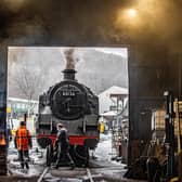 Engineers at Grosmont pictured unfreezing a steam Locomotive with fire, preparing it for a steam test.