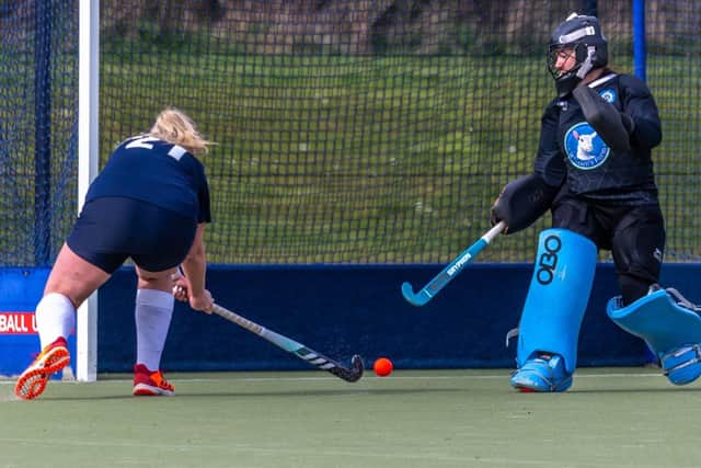 Emily Webster scores the winning goal v Thirsk to secure the title for Whitby HC ladies. Photos by Brian Murfield.