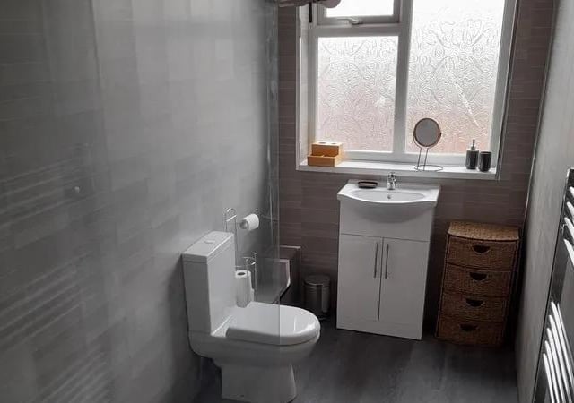 The house bathroom suite has large walk-in shower.