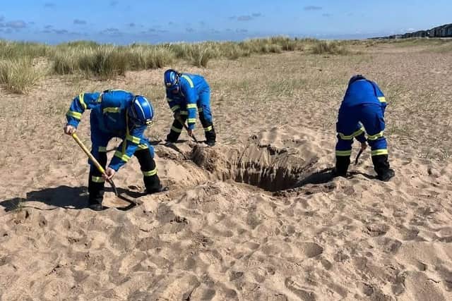 The coastguard team is warning holidaymakers about the dangers of digging large holes on the town’s beaches.