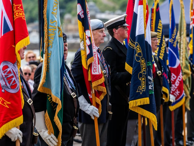 Standard-bearers line up for the start of the Scarborough Armed Forces Day.
