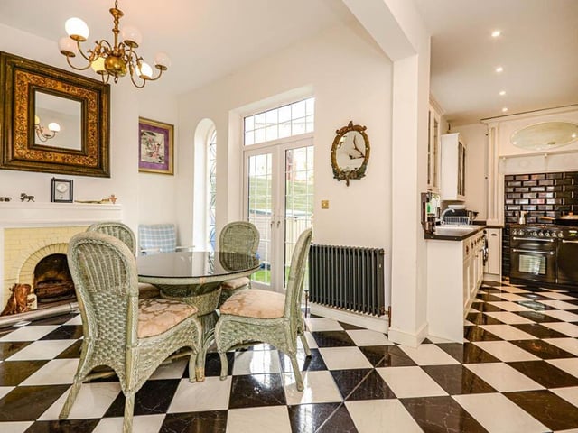 An open plan dining area, with French doors to the garden.