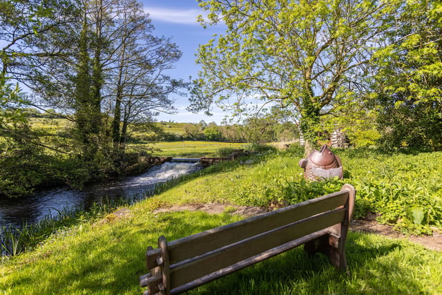 Sit and enjoy an impressive water feature from your garden, courtesy of the River Derwent.