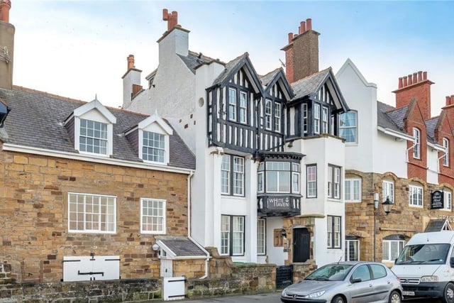 A close-up view of the attractive property containing the ground floor apartment.