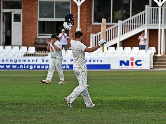 Matty Turnbull celebrates his century at North Marine Road against Sessay.