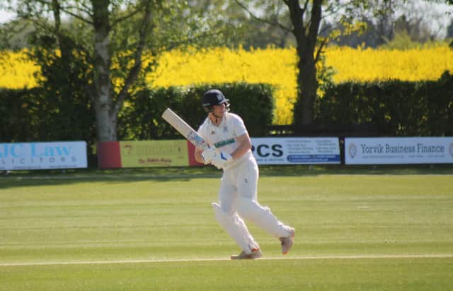 Jonny Shepherdson and Tom Neal in action for Woodhouse Grange CC. Photo by Phil Gilbank