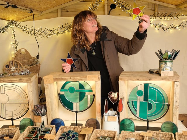 Janet Fraser with her glass creations. photo: Richard Ponter