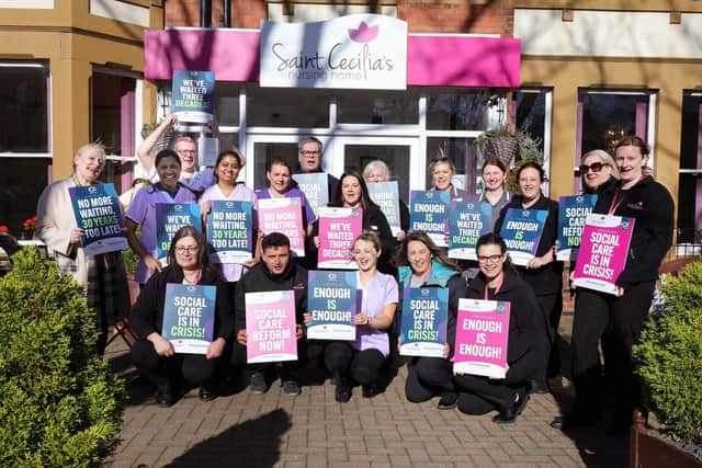 'Enough is enough' - the St Cecilia's team raises awareness about the plight of social care. picture: Richard Ponter