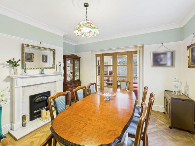 The elegant dining room has plenty of space for entertaining.