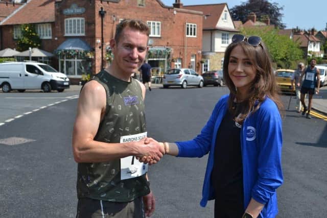 Scarborough AC runner Paul Lawton won the Scalby Fair 5K race.