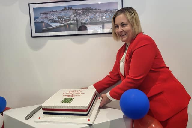 Scarborough and Whitby MP Alison Hume with cake at the constituency office opening. Courtesy Anttoni Numminen/LDRS