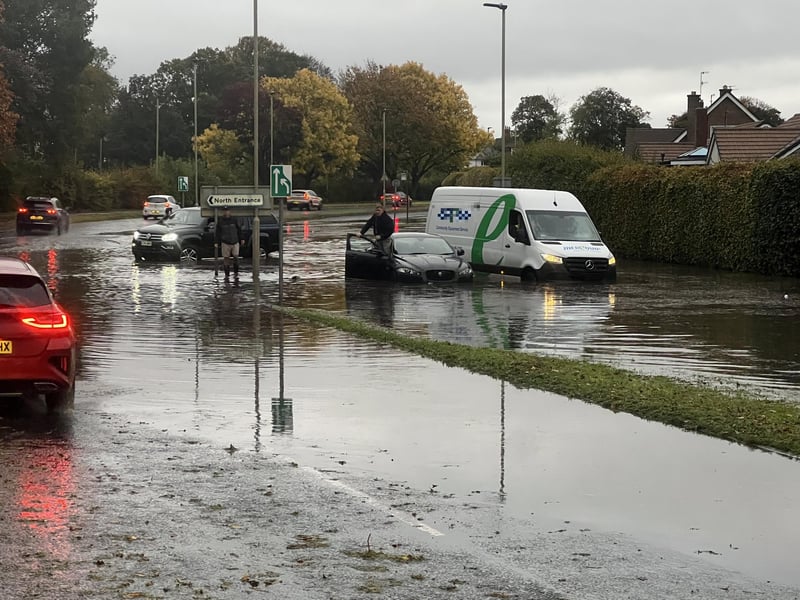 Vehicles struggled to traverse the flood.