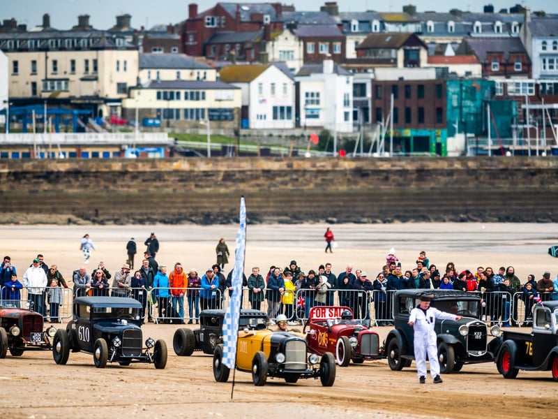 This years The Race the Waves Vintage Beach Race festival held on Bridlingon's south beach with over one hundred competitors taking part in the event from the early years of coastal motor racing to post-war American hot-rodders and drag racing culture. Picture By Yorkshire Post Photographer, James Hardisty. Date: 22nd April 2023.