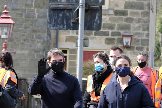 Tom Cruise and Hayley Atwell take a break from filming in Levisham