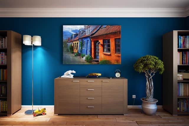 Some shades of blue are mellow and inviting, as in this room.