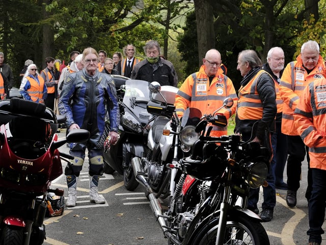Mourners gather to pay their respects