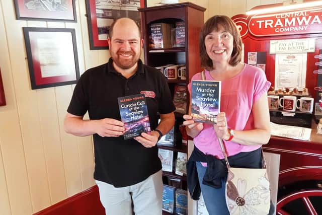 Glenda Young with Colin Powell, manager of Central Tramway which plays a part in her Scarborough-set novel Foul Play at the Seaview Hotel