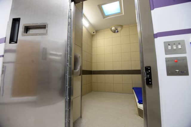 The absence of suitable police custody facilities has been described as inadequate.