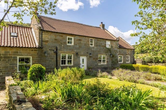 This seven bedroom detached house with Glamping Pods eleven stables and 13.6 acres is for sale with Cundalls for £1,350,000.