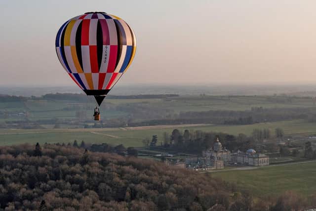 Balloonist John Till above Castle Howard.
picture by Nick Howard