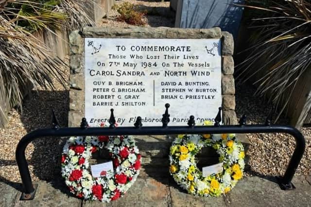 The wreaths at the Memorial Stone on Chapel Street.
