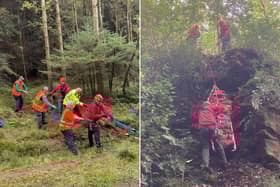 The female dog walker is hauled to safety at Dalby Forest.