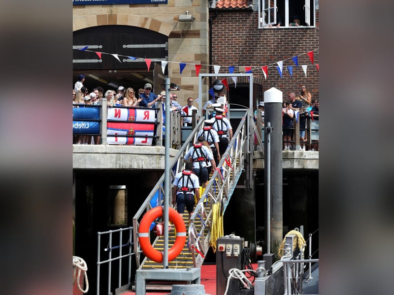 Arriving home, the crew make there way up to the Lifeboat Station.
picture: Ceri Oakes / RNLI