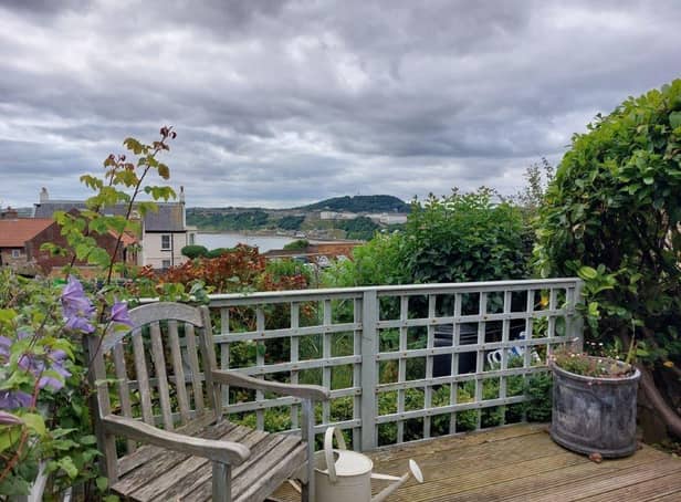 A decked area gives stunning views across the sea, and of St Mary’s Church and the castle.