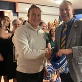 England Womens international Morwenna Talling makes the draw for the 2024 Warrendale Wagyu Pock 7s with competition boss Adrian Styche.