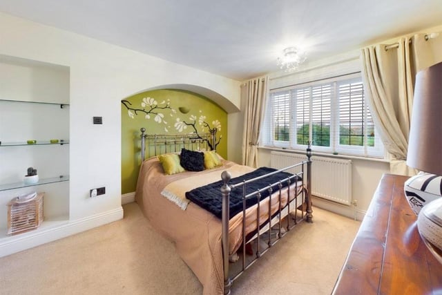 One of the stylish double bedrooms within the property.