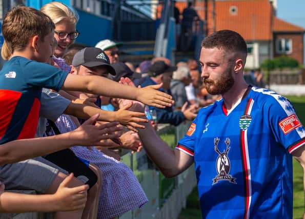 Bradley Fewster put Whitby Town 2-1 ahead at FC United of Manchester