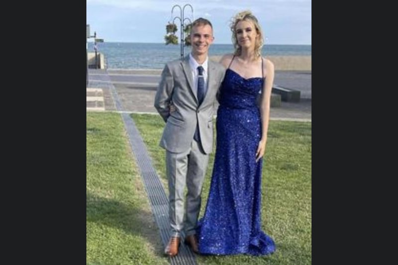 This is Kara Sutcliffe looking beautiful in blue- let us know if you recognise who she is with!