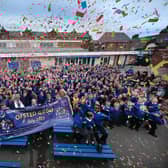Gladstone Road celebrate a good Ofsted inspection, headteacher Garry Johnson with staff and pupils.